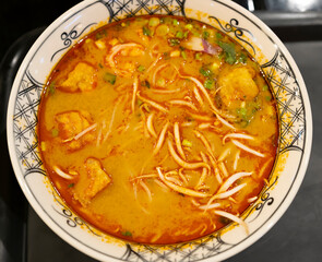 Vietnamese Shrimp Noodle Soup Bun tom dau close up top view.