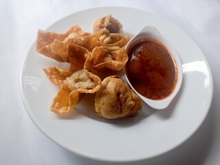 Batagor, made from fish or chicken dumpling, tofu, tapioca flour served with peanut sauce. Indonesian food