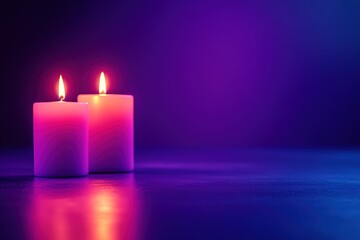 Two candles burning, dark studio, purple glow, reflection, peace