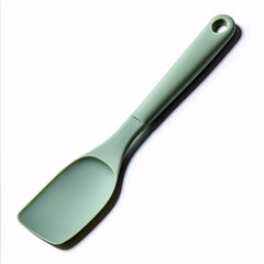 Obraz premium A sage green silicone spatula on white background