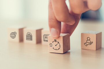 Customer service, speed of service concept. Wooden blocks with quick service icons. Response and resolution times in SLA. Ensuring clients receive timely help and service from providers.