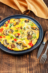 Classic egg omelet with seafood.