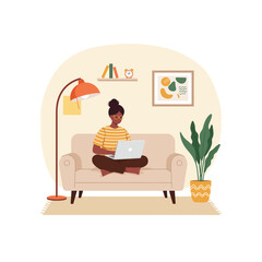 Woman Working on Laptop From Cozy Home Sofa