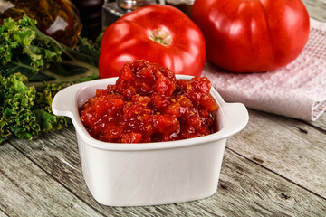 Diced ripe tomato with sauce
