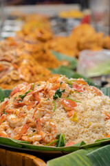 Fried rice with shrimp and vegetables. The rice is perfectly cooked and mixed with succulent shrimp and carrots, tomatoes and egg.