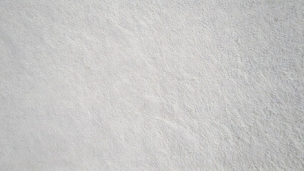 Obraz premium Close-up of white beach sand texture background