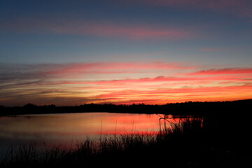 Obraz premium sunset over the lake