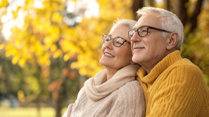 Senior couple enjoying autumn scenery together. Perfect for retirement romance, active aging, and lifelong partnership content.