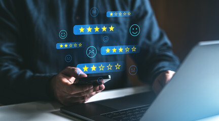 Digital star rating and review icons floating over a person using a smartphone and laptop.