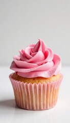 Delicate pink rose swirl cupcake, white background, sweet, floral