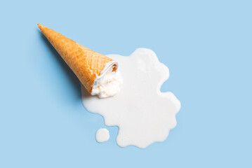 waffle cone with melted white ice cream