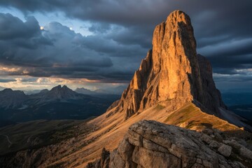 Obraz premium Majestic Mountain Peak Wields Halberd Against Stormy Sky: Epic Landscape Photography