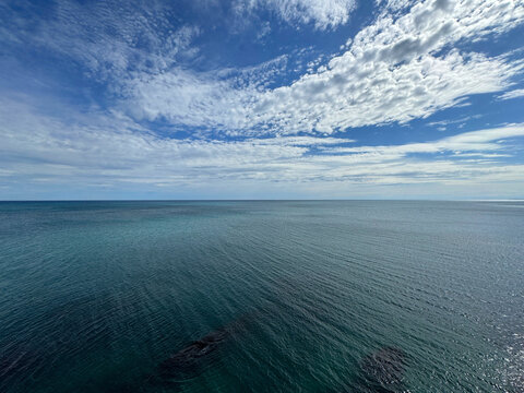 Amazing ocean wide sea turquoise blue water beautiful sky clouds.