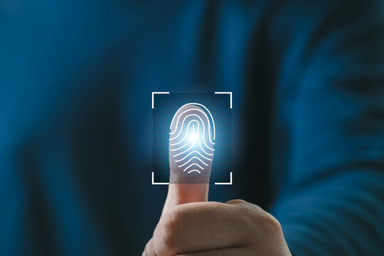 Close-up of a person using biometric fingerprint scanner technology. Innovative digital security solution for authentication and identification.