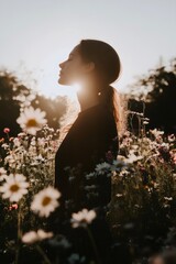 Woman enjoying the sunset in a field of daisies, breathing fresh air and connecting with nature