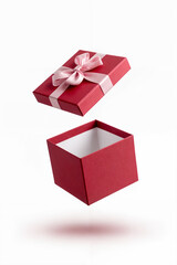 A luxurious red gift box with an elegant white bow, presenting a stylish and sophisticated unboxing experience. Perfect for birthdays, weddings, special occasions, and holiday celebrations, this chic 