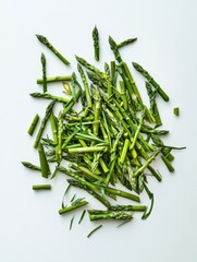 Fototapeta premium A cluster of fresh asparagus spears on a white background.