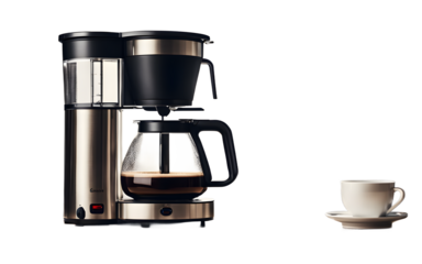 A modern drip coffee maker with a glass carafe on a white  plain background