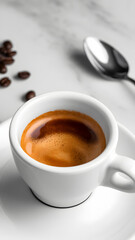 A freshly brewed espresso in a white cup, surrounded by coffee beans, exuding warmth and aroma.