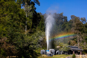 Hot spring geyser with geothermal energy power heat steaming from the underground for sauna and clean electricity resource