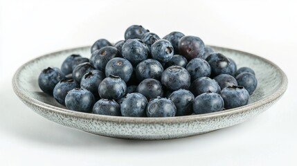 Blueberries on a plate with a white background