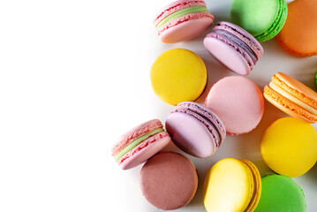 A clean, minimalist display of assorted macarons, showcasing their vibrant colors and textures