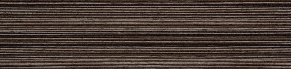Striking contrasts of dark roast and milky latte lines orchestrate the bold pattern of this wenge veneer