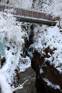 Mountain Canyon with Wooden Bridge in Winter