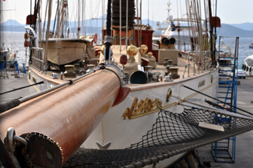 The bowsprit of a white sailing vessel in Aganlar Marina and shipyard located in Bodrum. It is a...