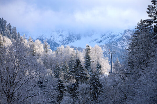 Winter mountain landscape with cable car