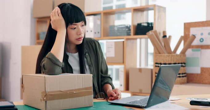 Laptop, logistics and tired with Asian woman in office for management of delivery or distribution schedule. Box, burnout and computer with exhausted person in supply chain depot for backlog or delay