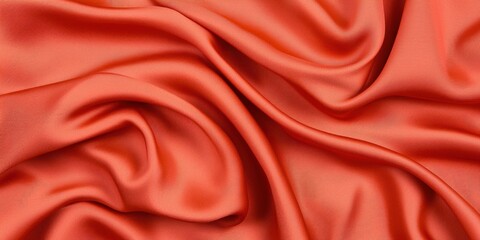 Obraz premium Elegant orange silk fabric textiles store close-up studio softness and texture highlight