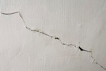 cracked wall. Cracked concrete wall broken wall at the outside cement corner that effected with...