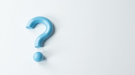 A light blue question mark, thoughtfully separated, rests on a pristine white surface, symbolizing inquiry and the quest for knowledge.