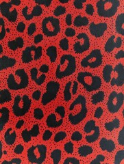 Obraz premium Mosaic pattern of leopard spots in bold red and black