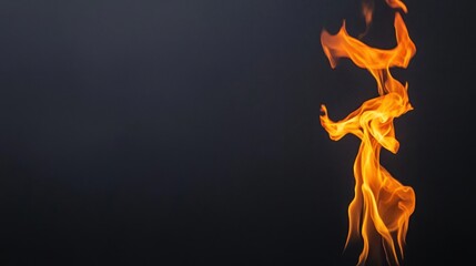 Fiery Orange Flames Against Dark Background