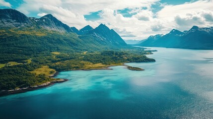 Obraz premium Serene Fjord Landscape: Breathtaking Aerial View of Majestic Mountains and Turquoise Waters