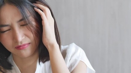 Unwell, ill and tired young asian woman having fever, headache, fatigue, disappointment, failure, problem, worry, trouble concept image