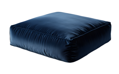 A soft velvet floor cushion in a deep blue shade on a empty plain background