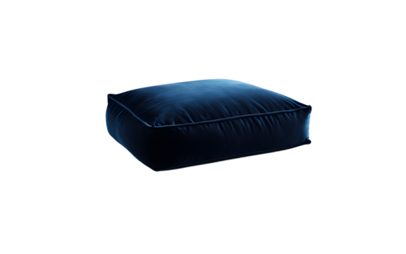 A soft velvet floor cushion in a deep blue shade on a empty plain background