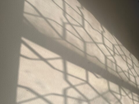 Abstract islamic pattern shadow on wall, ramadan islamic background.