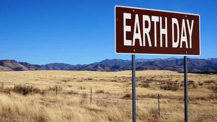 Earth day word on road sign