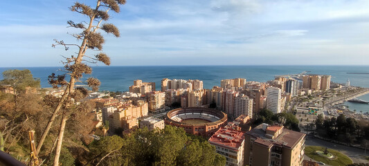 Malaga: panoramic view of port and Plaza de Toros, Spain