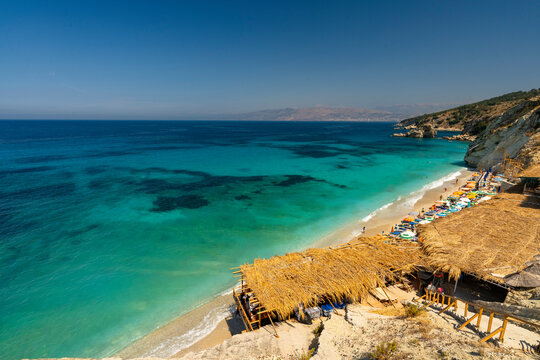 Albania, Vlorë County, Ksamil, Shpella e Pëllumbave - 17 August 2024 - Glimpse of Shpella and Pëllumbave and its crystal clear sea on a clear day