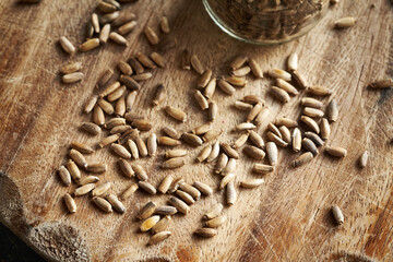 Milk thistle seeds spilled on a table