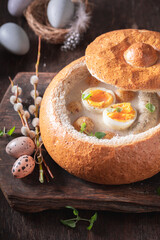 Classic sour soup served in bread for Easter.