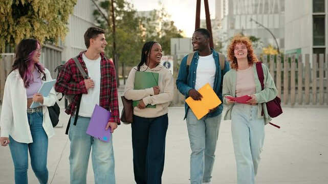 International college student friends talking and walking out of University