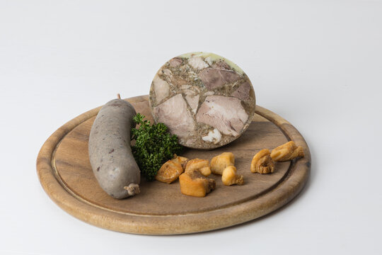 Czech specialty - pork meat products for eating..Homemade tlacenka, jitrnice, cracklings, bread, fried lard