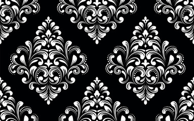 Wallpaper in the style of Baroque. White and black floral ornament. Seamless vector background. Graphic pattern for fabric, wallpaper, packaging. Ornate Damask flower illustration.