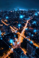 Fototapeta premium Cityscape at night with digital connections and lights